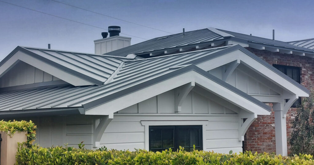 Standing seam metal roofing system installed on a residential home.